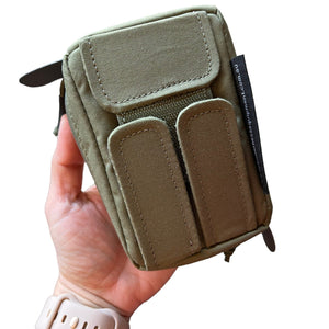 Wilderness Equipment Tech Pouches, showing Medium Olive. Backside of these pouches have multiple velcro points. Perfect for any adventure, camping, 4x4ing, hiking.