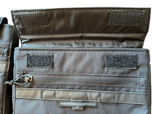 Wilderness Equipment Laptop Sleeve, easy open with velcro. Comes with a zip pocket and another velcro front pocket. 