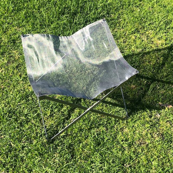 Red Roads Riser, scissor arm collapsible firepit. Comes with the stainless steel mesh  and nylon bag. Also doubles as a stand for the Red Roads Blaze n BBQ Firepit, to increase height. 
